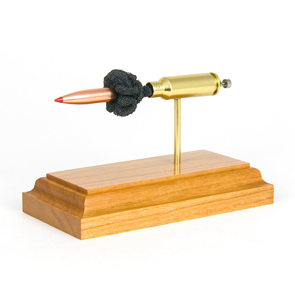 6.5 Grendel cutaway cartridge display mounted on solid hardwood base