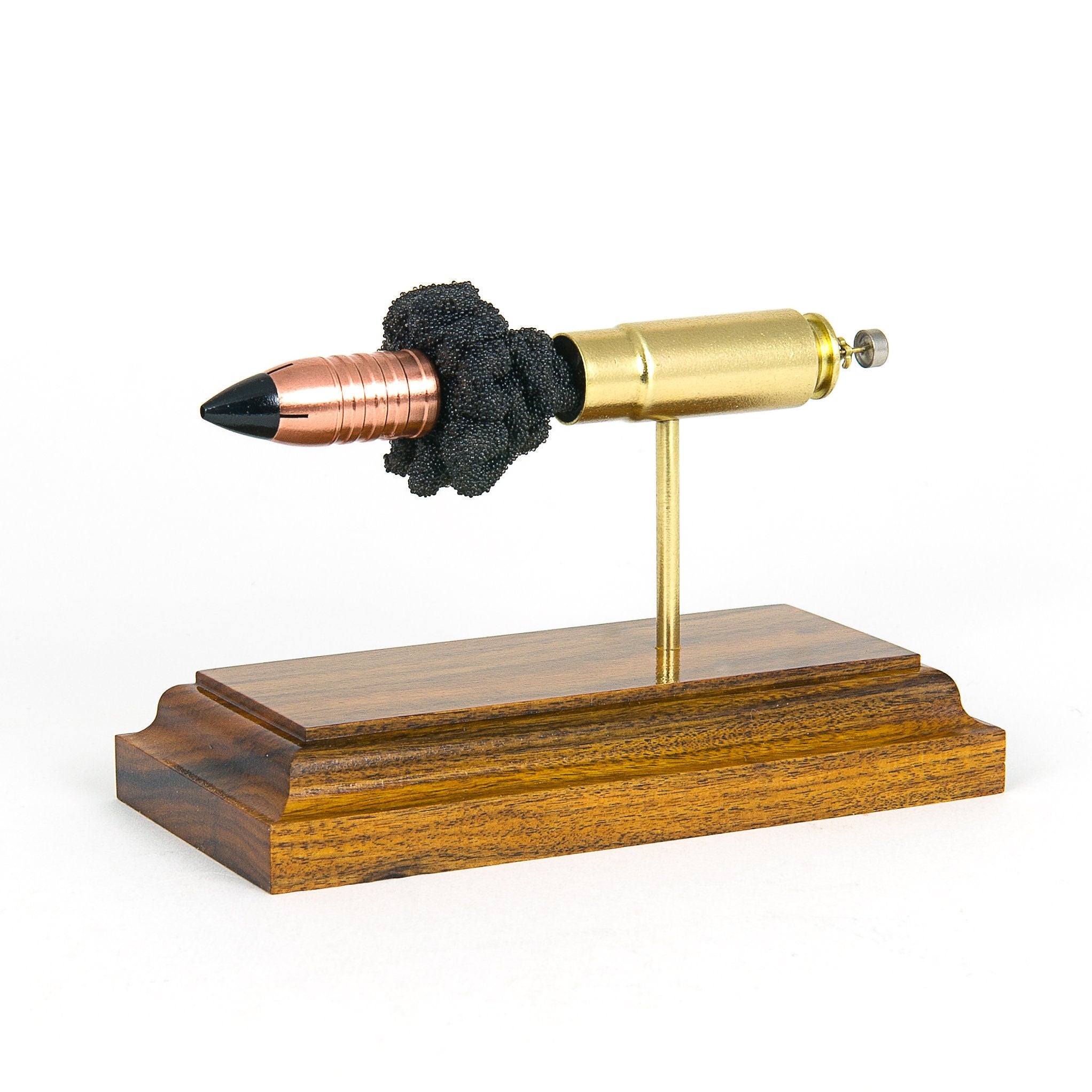 458 SOCOM cutaway cartridge display mounted on solid hardwood base