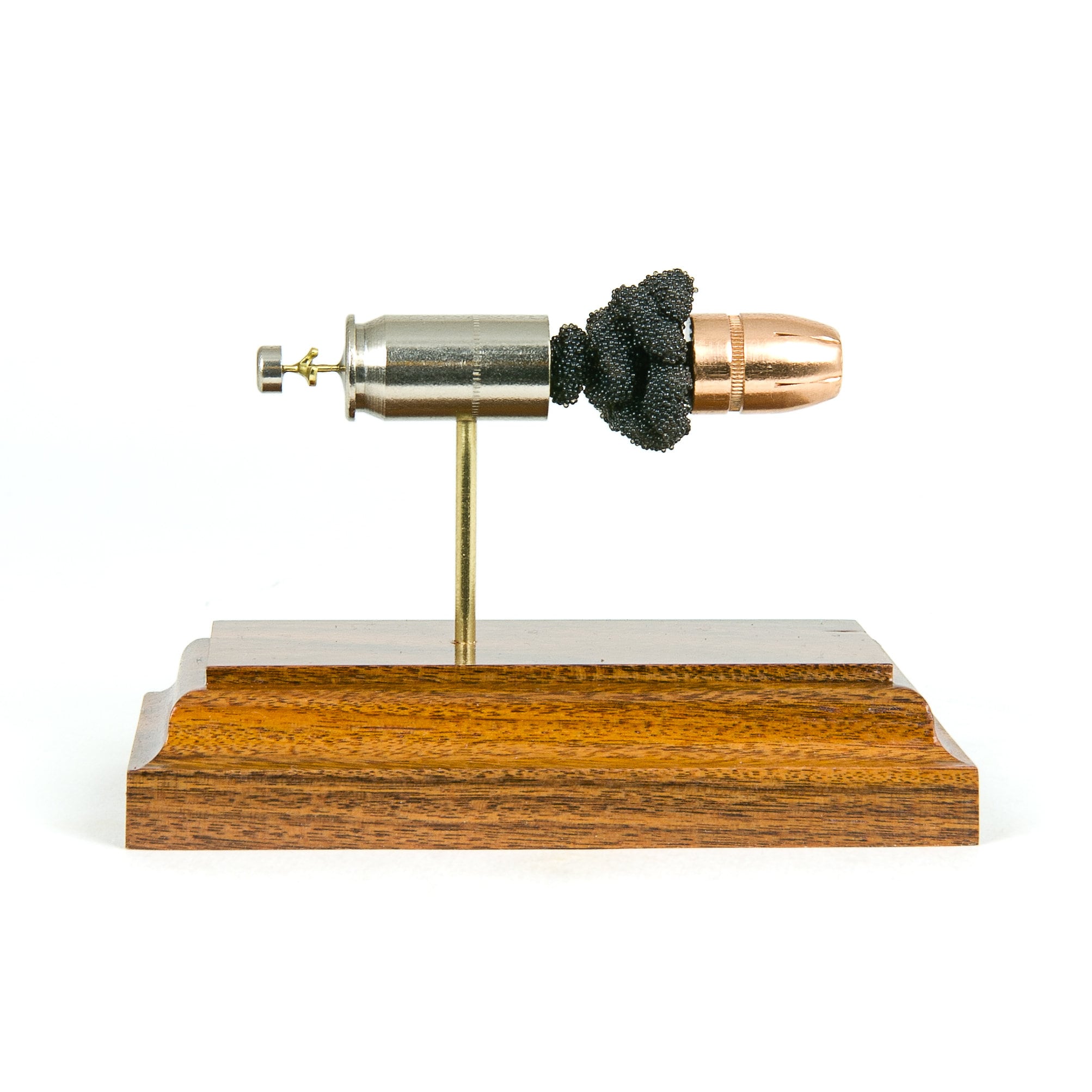 Sectioned 45 Auto +P Federal HST cartridge showing primer case powder and JHP bullet aligned horizontally