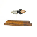 45 Auto +P Federal 230gr HST JHP expanded cartridge display model on hardwood base