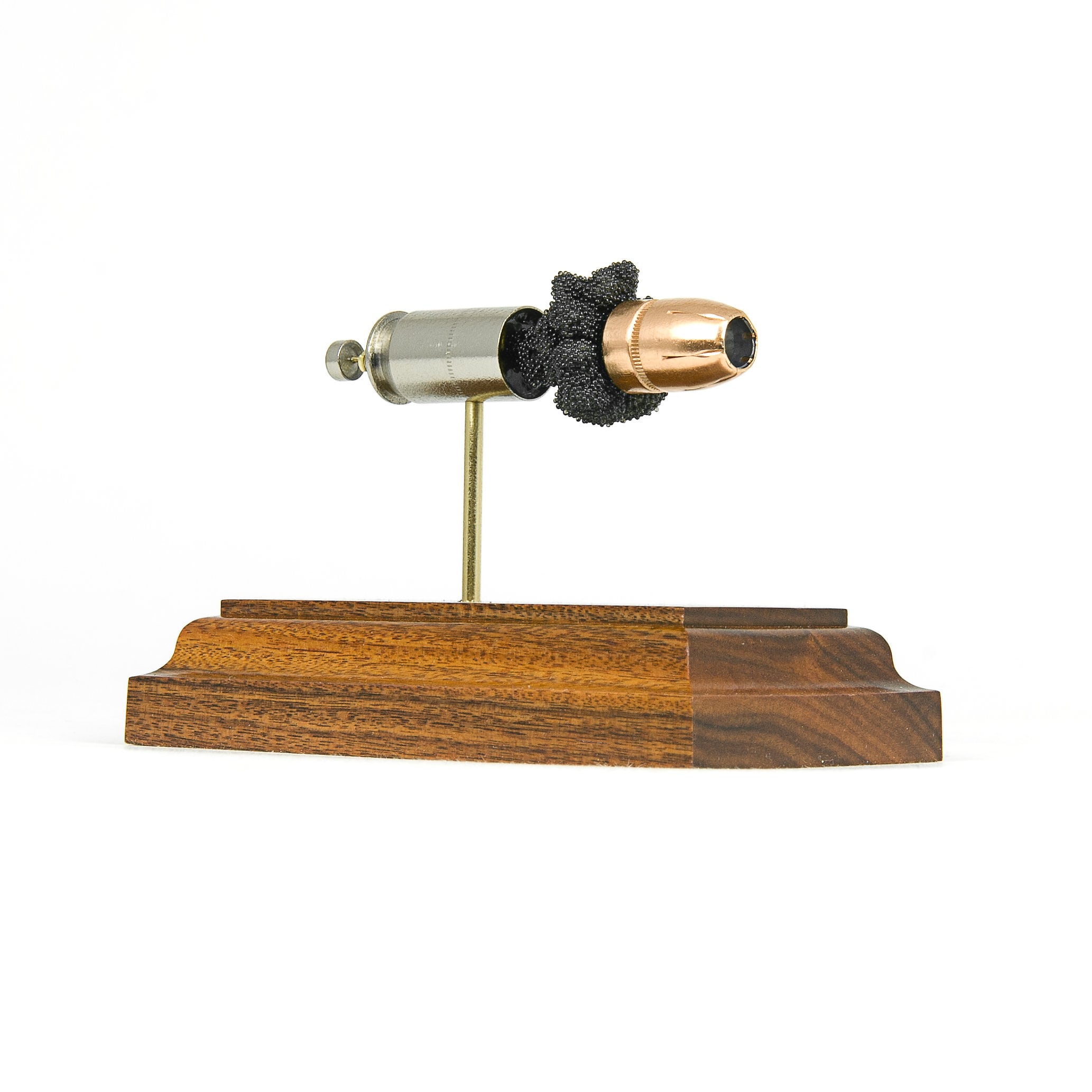 45 Auto +P Federal 230gr HST JHP expanded cartridge display model on hardwood base