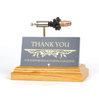 Pistol caliber business card holder expanded cartridge display on hardwood base