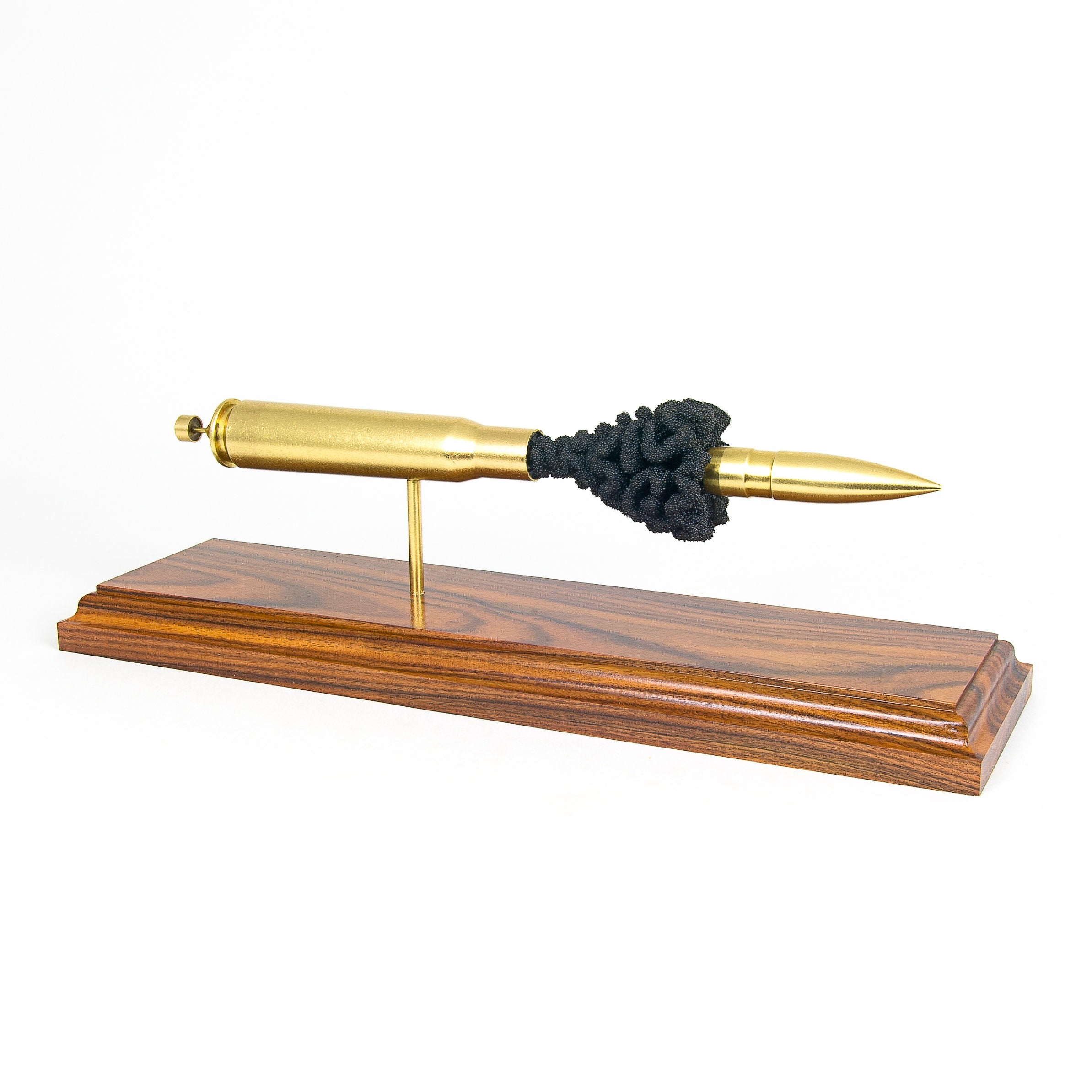 50 BMG solid brass projectile cutaway cartridge display on rosewood base