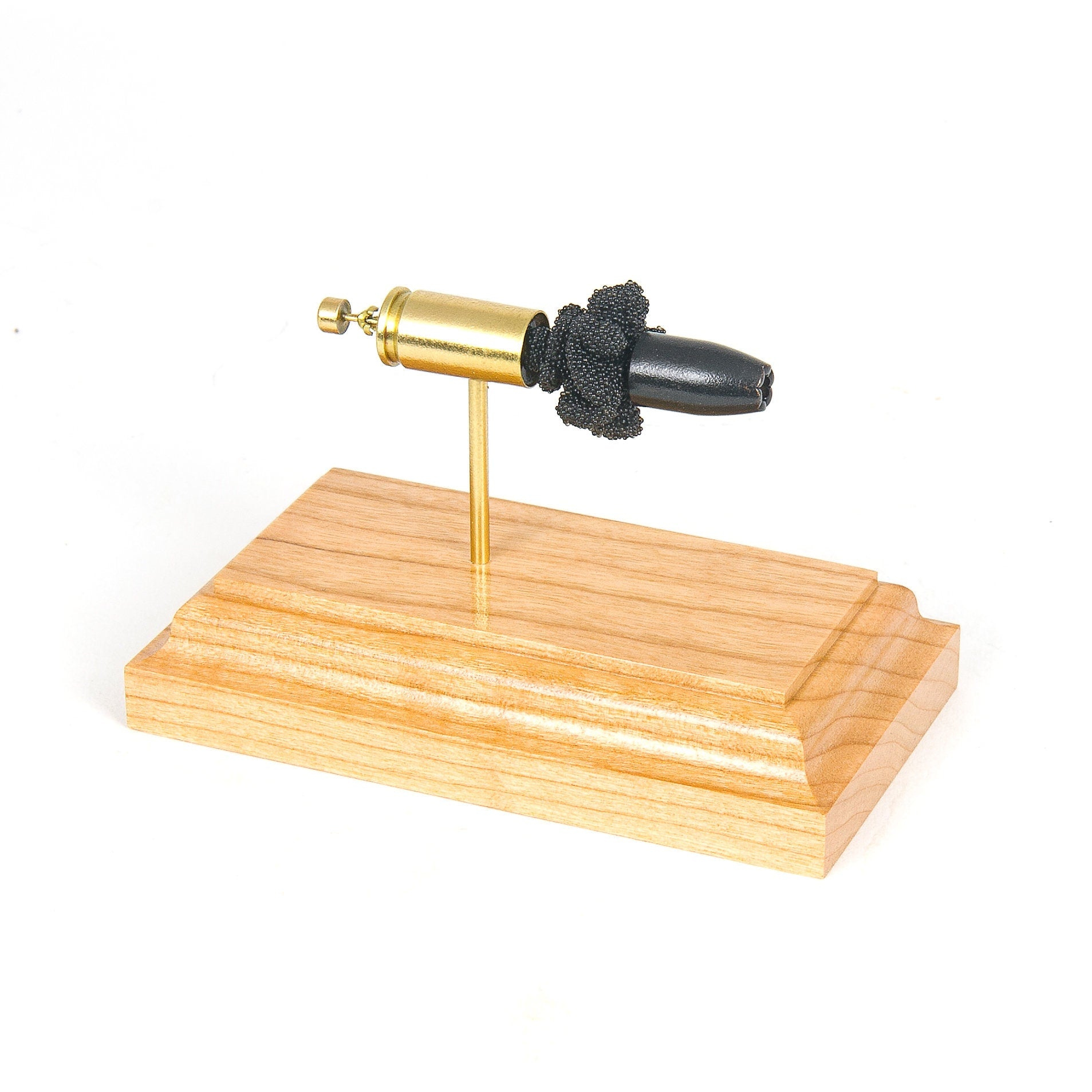 Expanded 9mm Luger Winchester Ranger SXT cartridge display on cherry wood base Black Talon