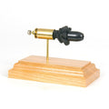 Expanded .45 Auto Winchester Ranger SXT cartridge display on cherry wood base

