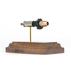 Expanded 40 S&W Federal HST 180gr JHP cartridge display on hardwood base