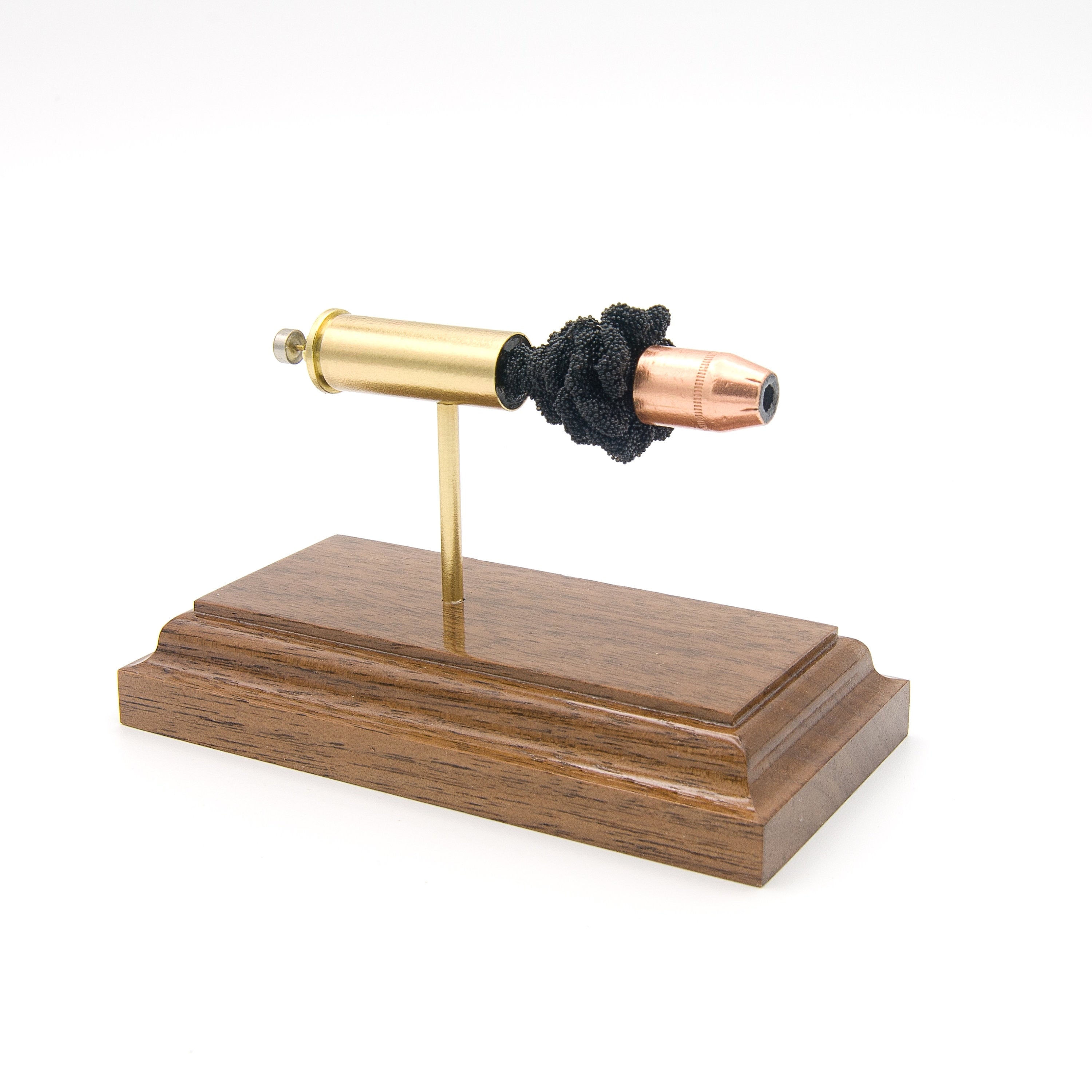 44 Remington Magnum PPU 240gr JHP expanded cartridge display model on hardwood base