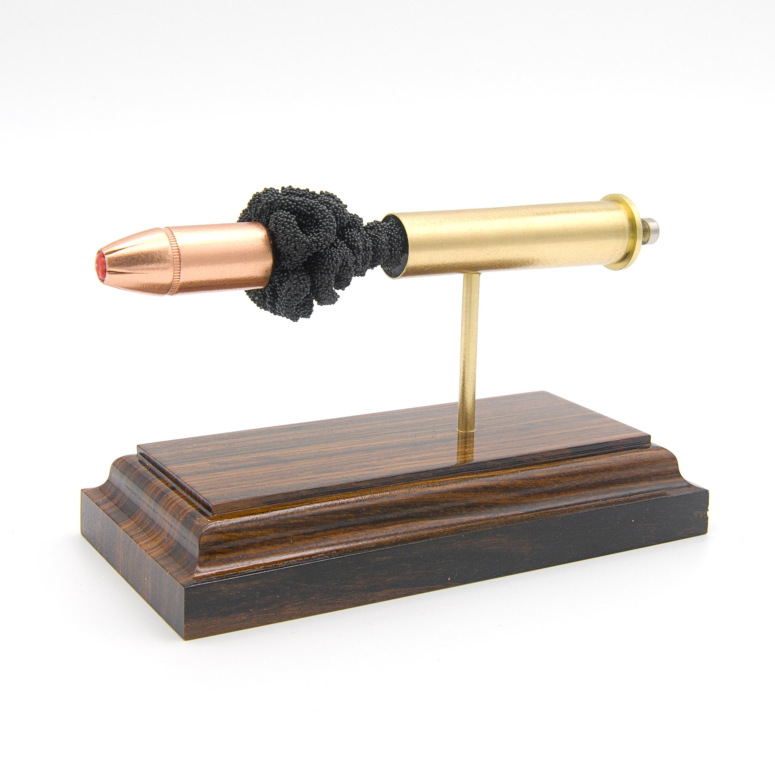 Sectioned 45-70 Government Sub-X cartridge showing primer case powder and 410gr bullet aligned horizontally