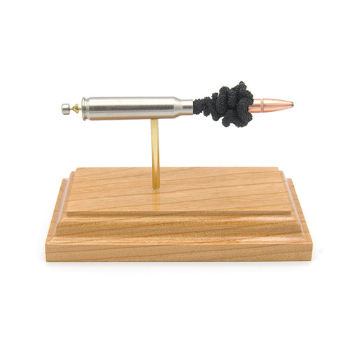 Expanded .223 Rem Speer Gold Dot cartridge display on cherry wood base