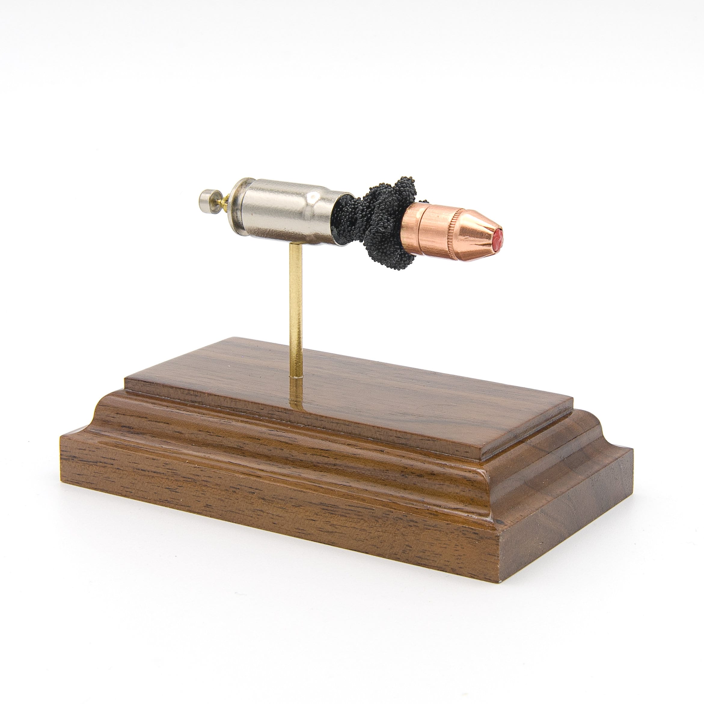 Expanded 357 SIG Hornady Critical Duty FlexLock cartridge display on hardwood base