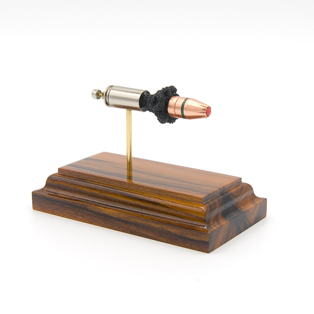 9mm Luger 135gr FlexLock Hornady Critical Duty expanded cartridge display on rosewood base