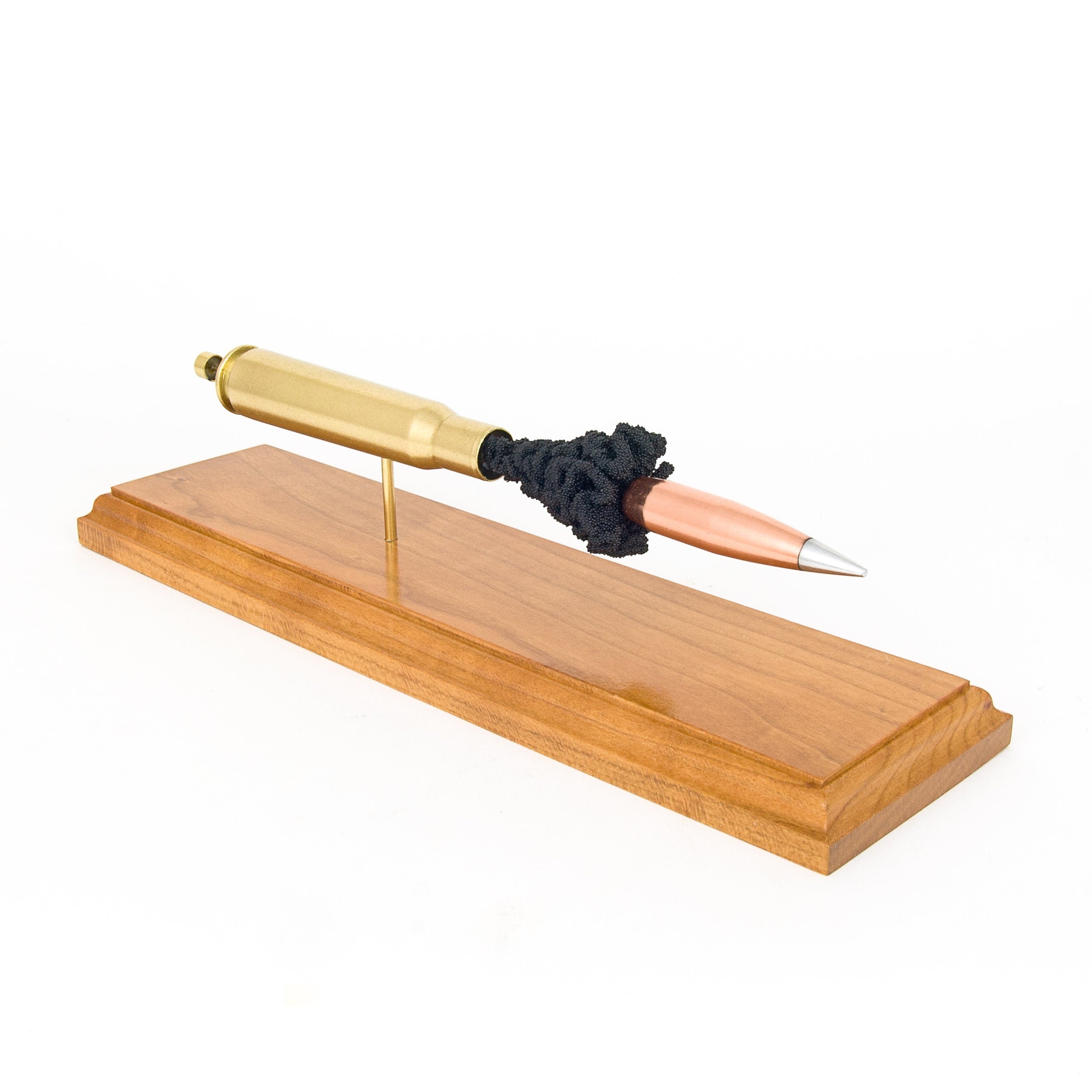 50 BMG Hornady A-MAX match bullet cartridge display on cherry base