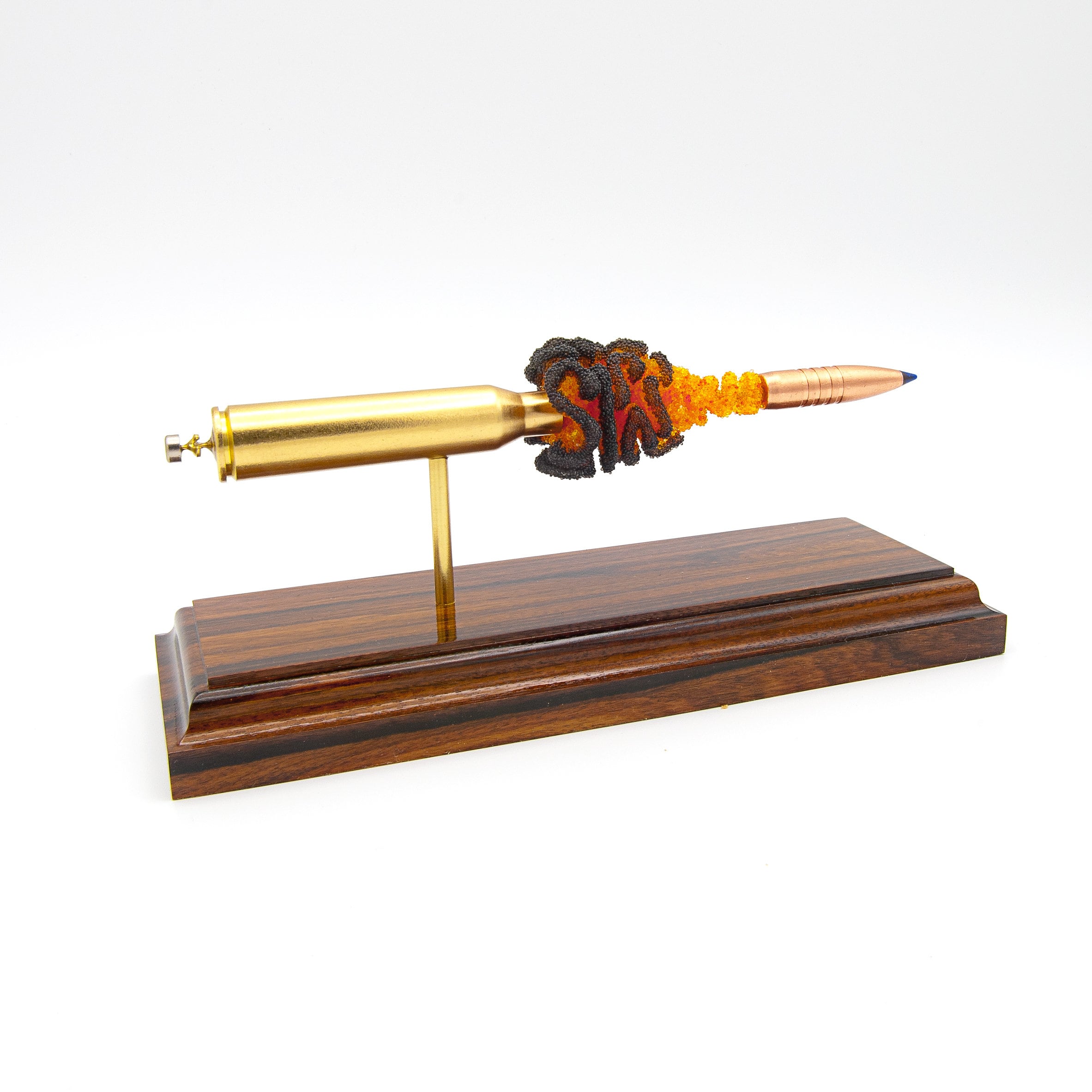 exploded 338 lapua magnum cartridge with fire powder effect