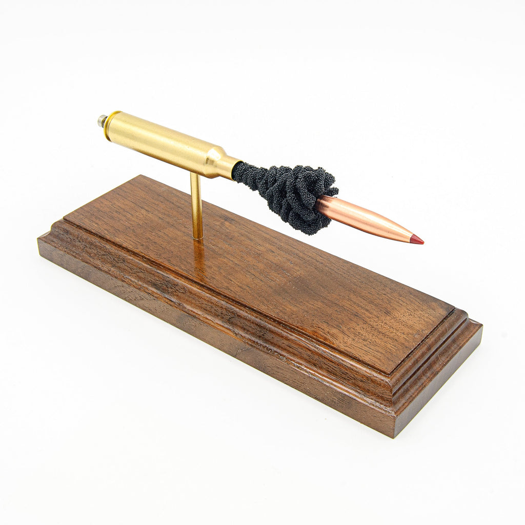 Expanded 300 PRC Hornady 225gr ELD-Match cartridge display on hardwood base