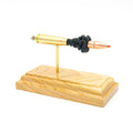 Handmade 7.62x39mm Hornady SST cartridge display aligned on solid wood base