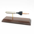 Expanded 300 PRC Hornady 190gr CX Outfitter cartridge display on hardwood base