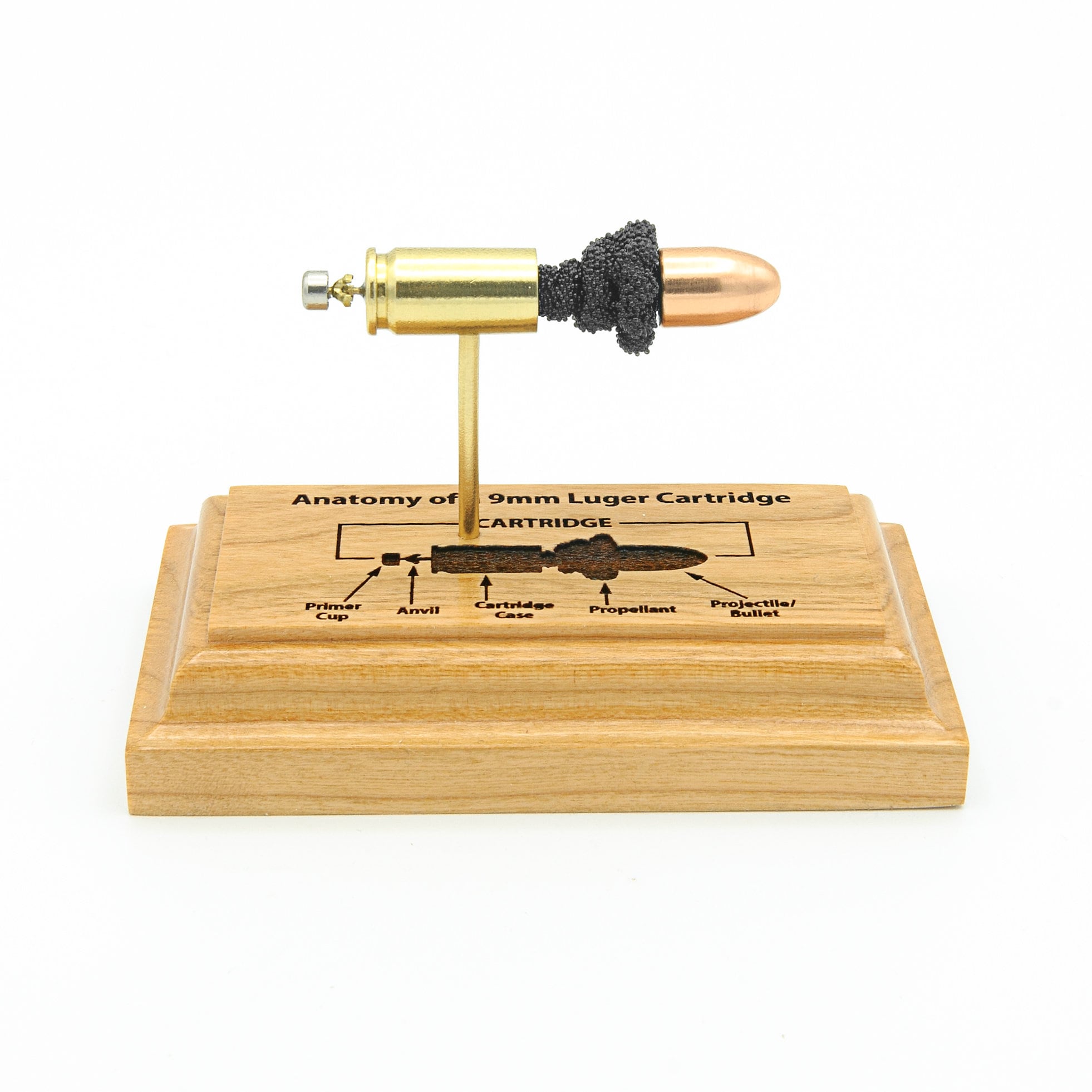 9mm Luger sectional cartridge model with engraved hardwood base