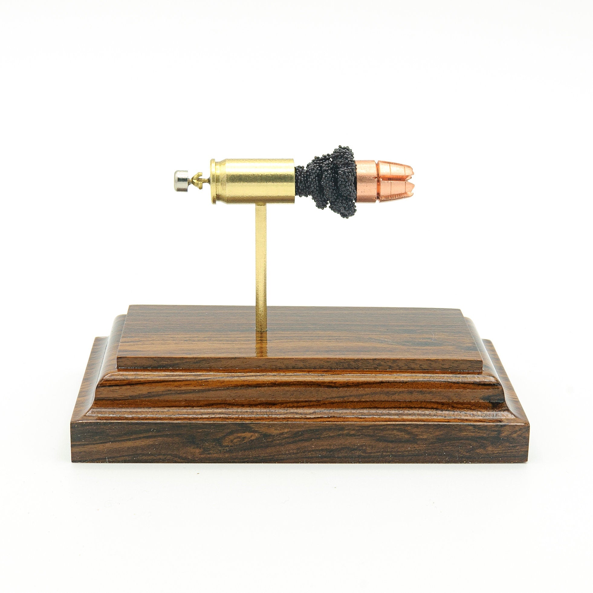 Expanded 380 Auto G2 Research RIP cartridge display on hardwood base