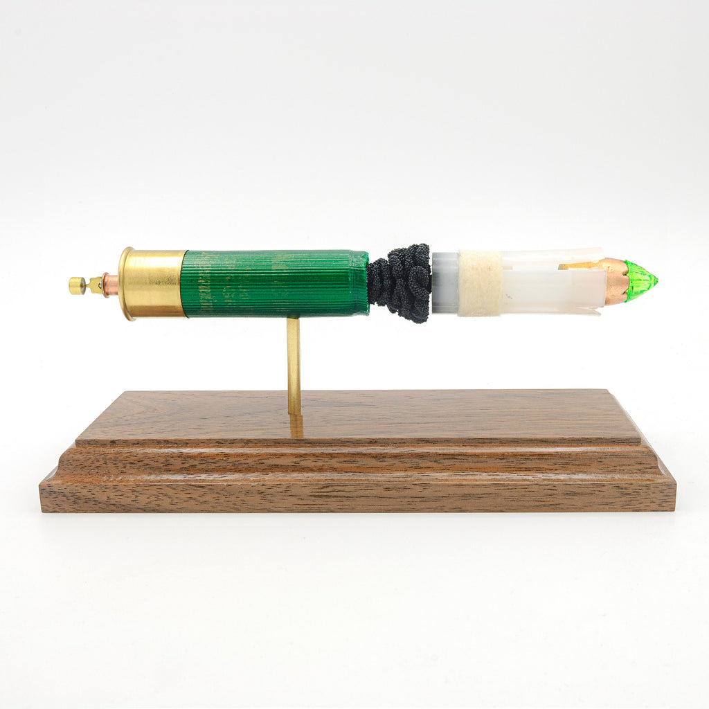 expanded 12ga shotshell showing primer wad and slug