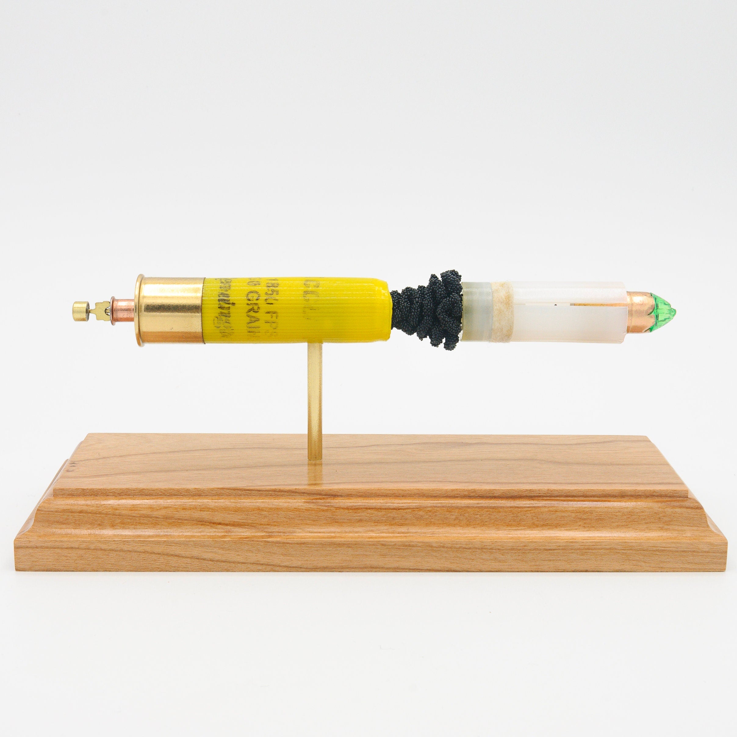 Handmade 20GA shotgun slug display for reference and education