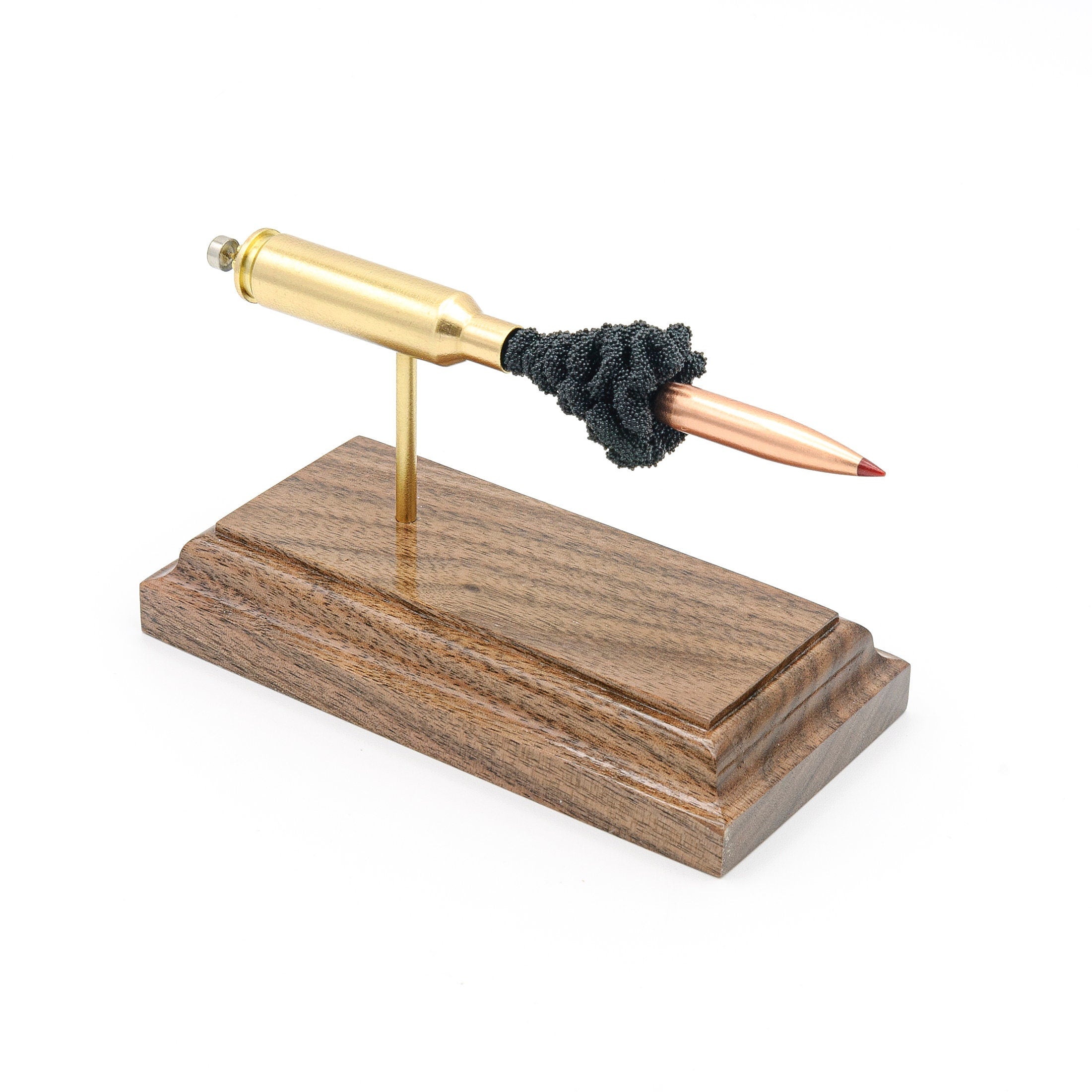 6.5 Creedmoor cutaway cartridge display mounted on solid hardwood base