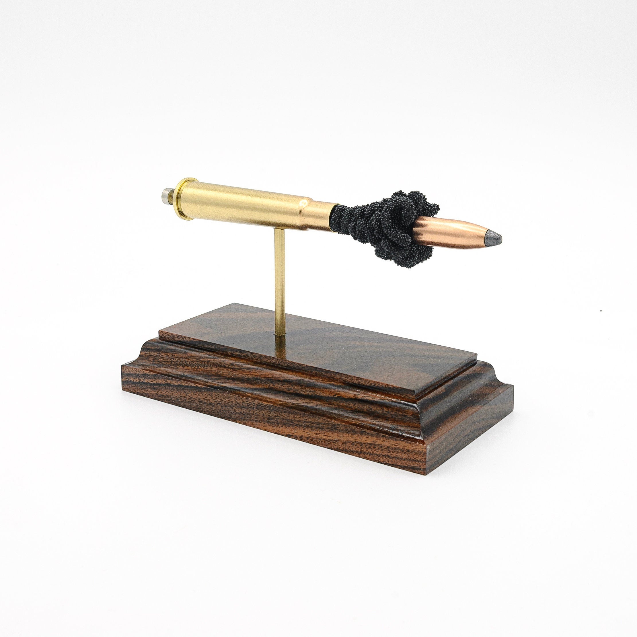 Expanded 303 British Sellier & Bellot 150gr Soft Point cartridge display on hardwood base