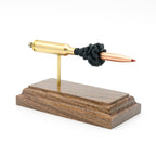 Sectioned 6.5 Creedmoor cartridge showing primer case powder and 143gr ELD-X bullet aligned horizontally