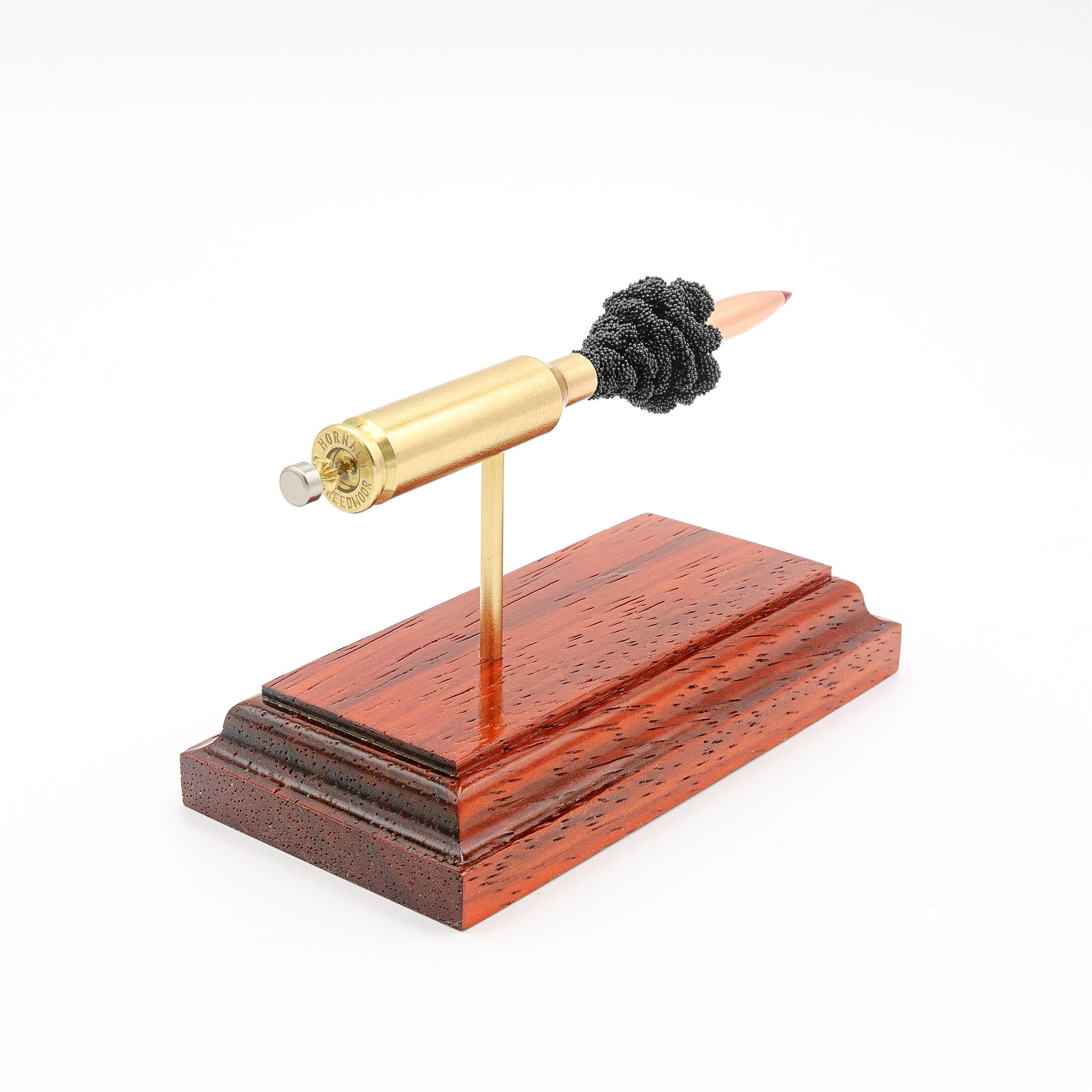 Handmade 6mm Creedmoor Hornady ELD-X cartridge display aligned on solid wood base