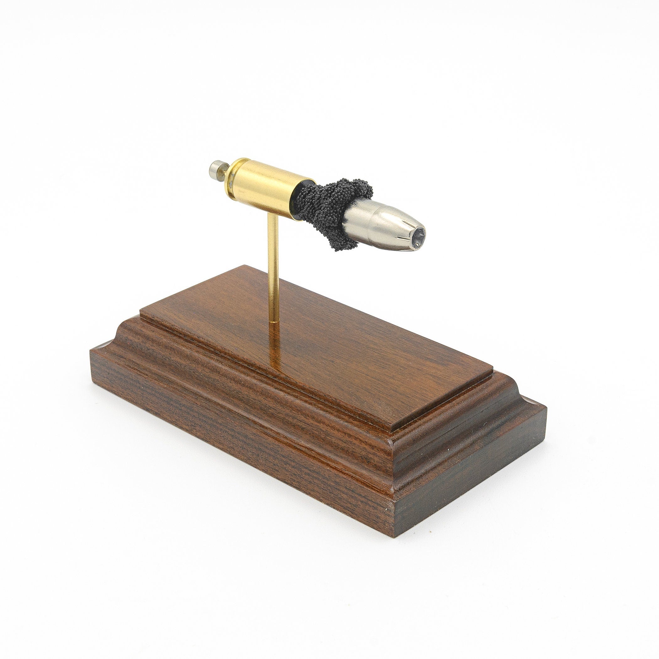 9mm 147gr SilverTip sectional training display hardwood base