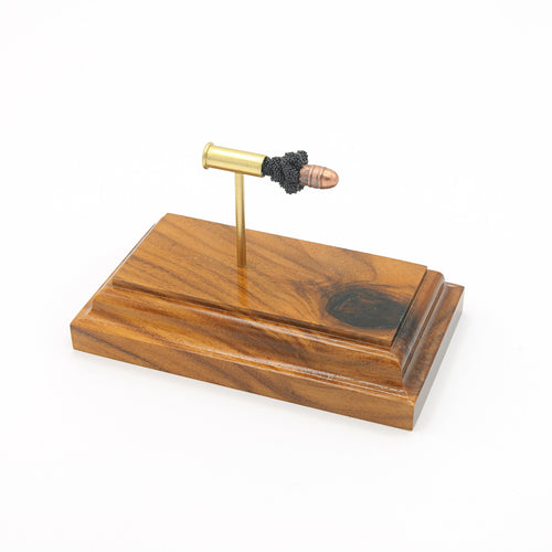 Expanded .22 Long CCI High Velocity cartridge display on Bolivian rosewood base