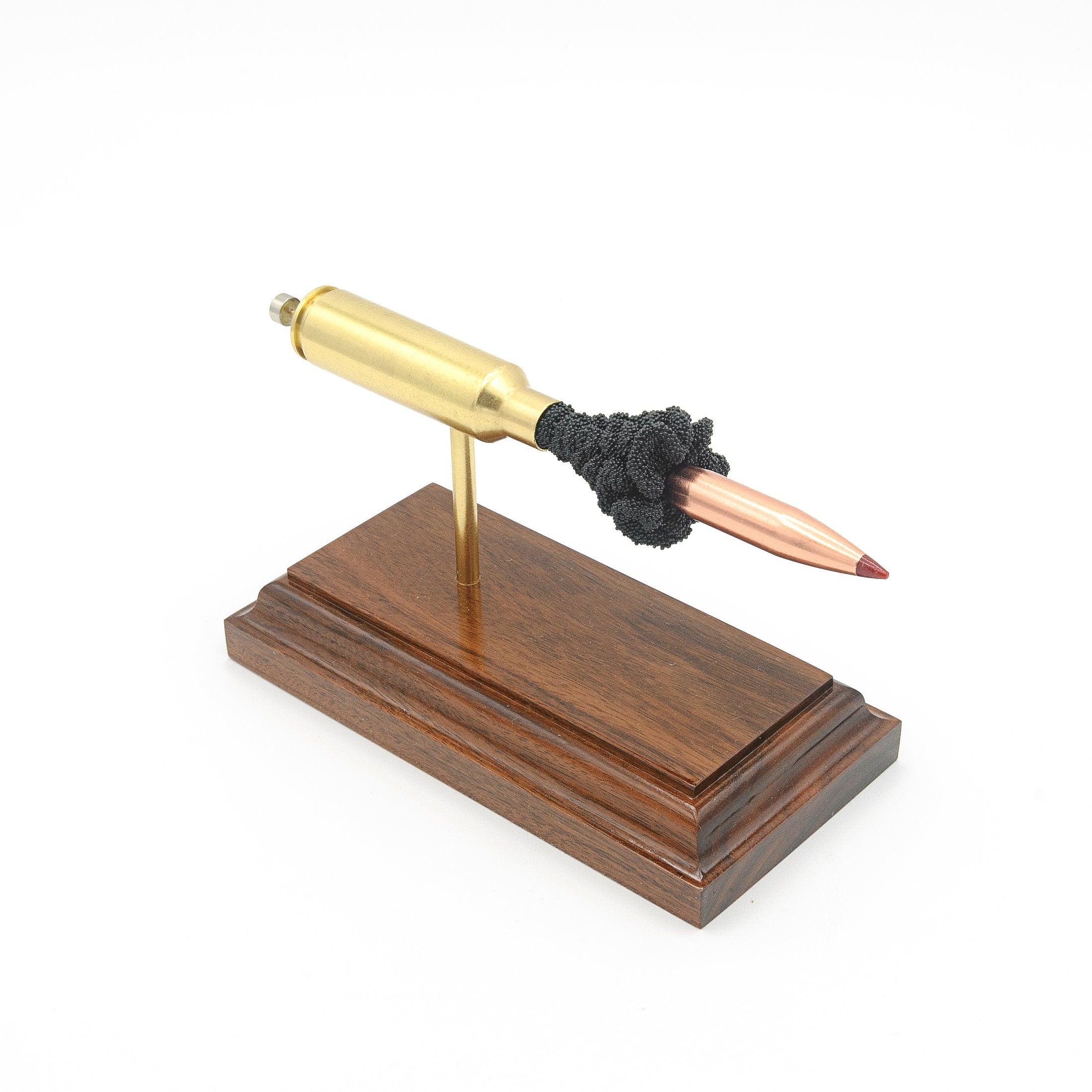 Expanded 300 WSM Hornady Precision Hunter 200gr ELD-X cartridge display on hardwood base