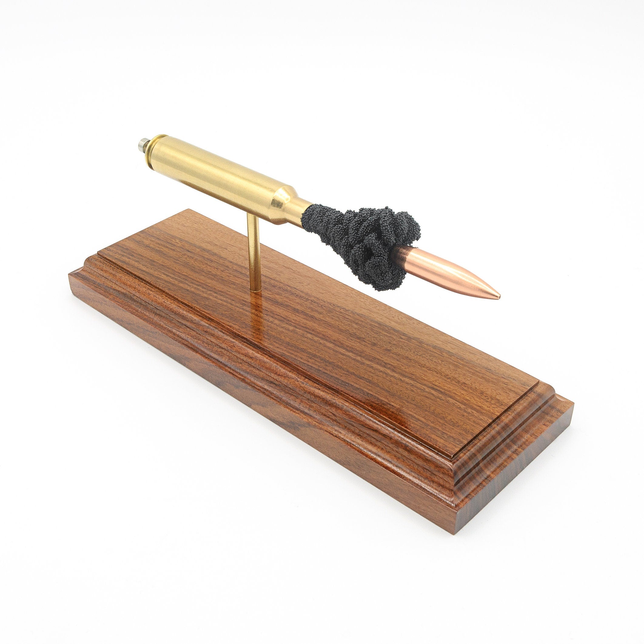 Expanded 300 RUM Sierra 200gr MatchKing cartridge display on hardwood base