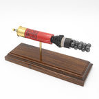 Expanded 12 gauge Winchester Super-X shotshell display on Bolivian rosewood base