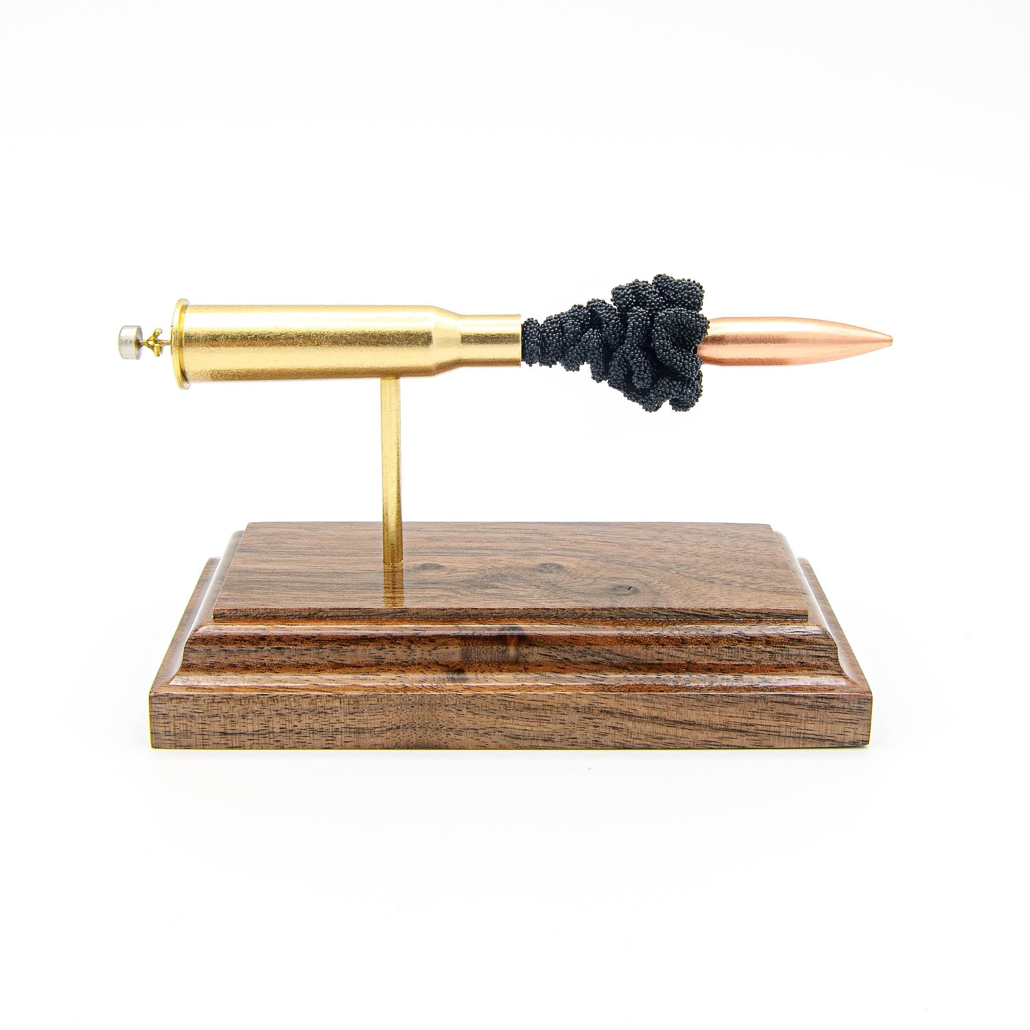 Aligned 7.62x54R cartridge anatomy model showing separated internal components