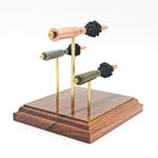 inert exploded ammunition display on hardwood base