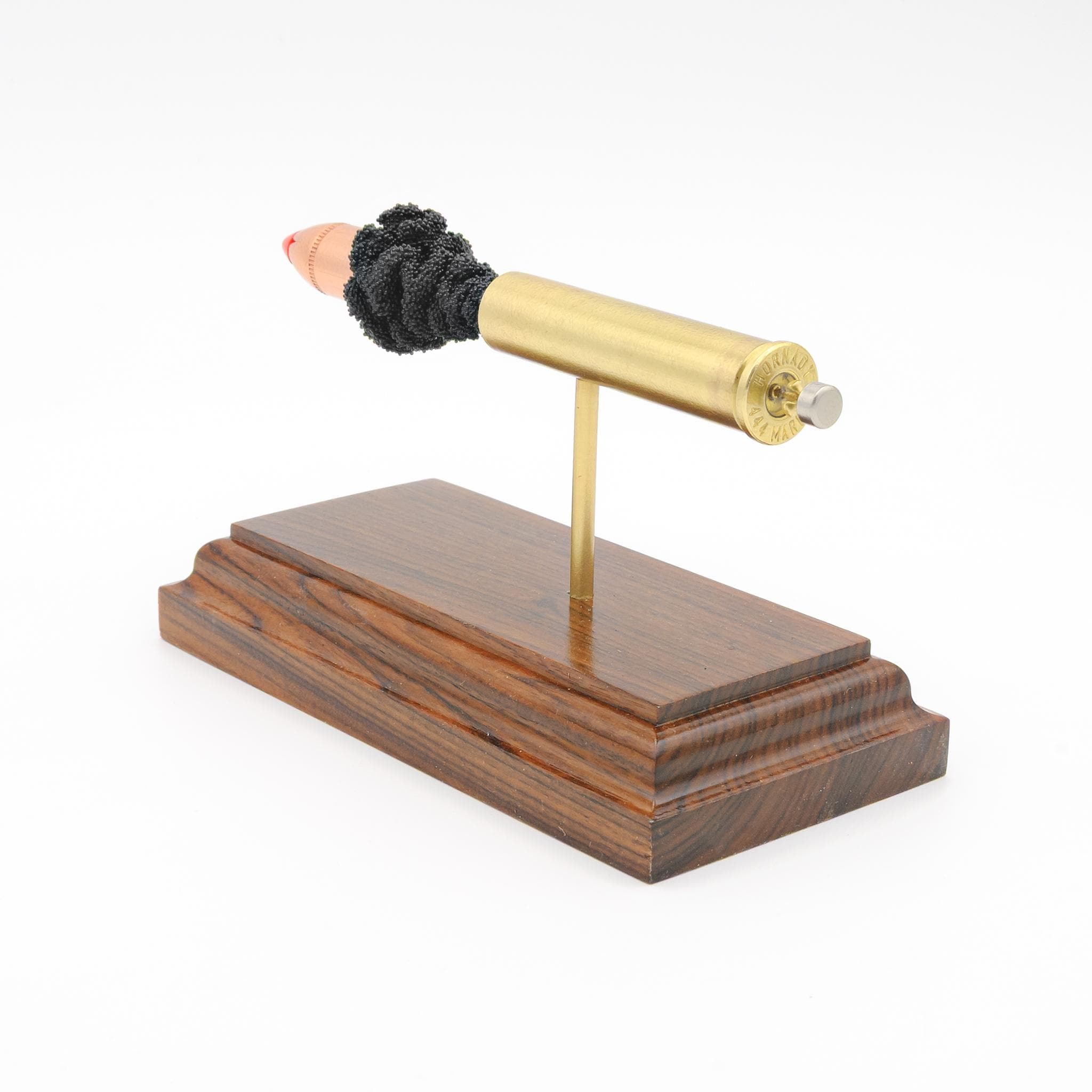 Big bore lever action rifle cartridge cutaway display mounted on hardwood base